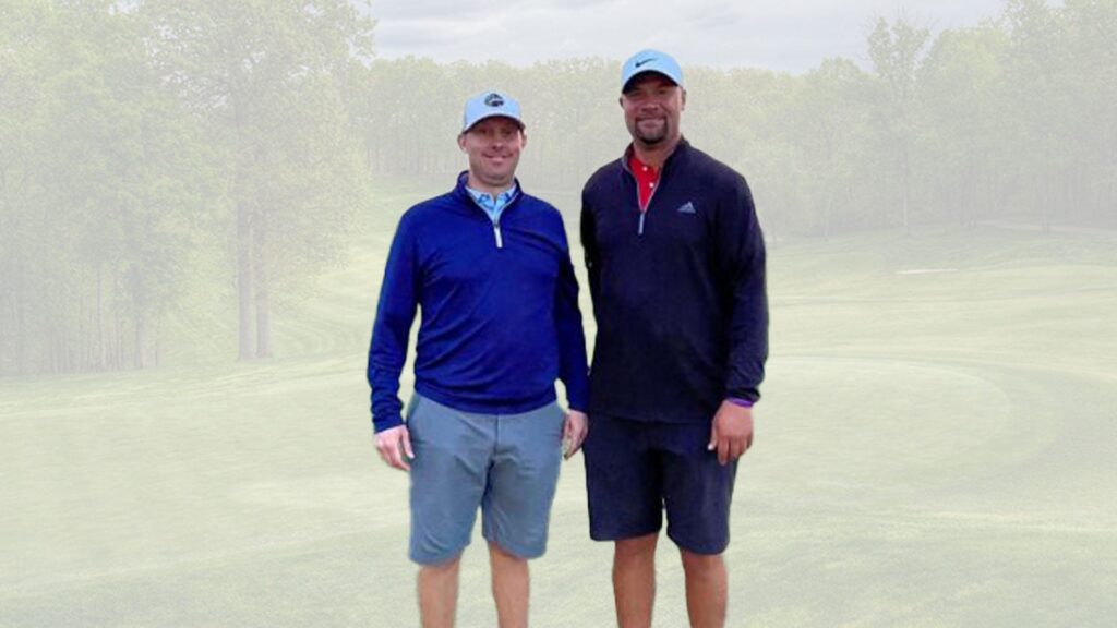 jcc fourball champions standing next to one another